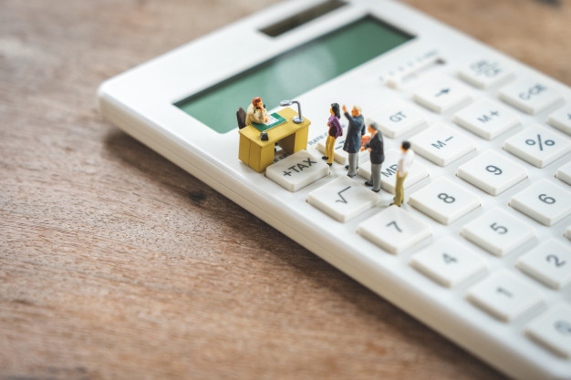 tiny people on a calculator