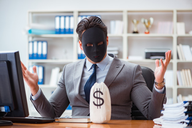 masked man with money